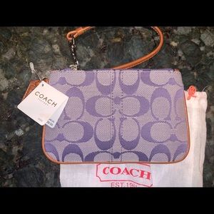 Coach wristlet purple